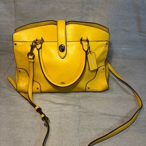 Yellow coach bag.